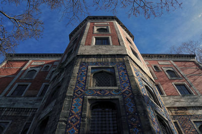 Low angle view of old building against sky