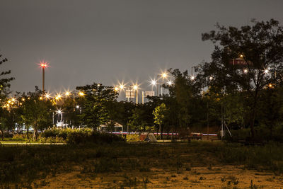 Illuminated street light at night