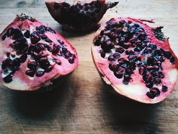 Close-up of pomegranate slices on table