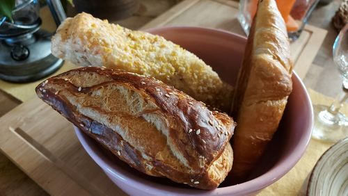 Close-up of food in plate. pastries in pieces. the pastries are stacked in a ceramic bowl.