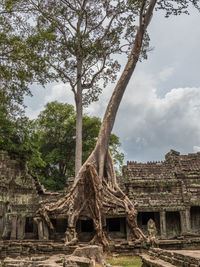 Low angle view of old temple against sky