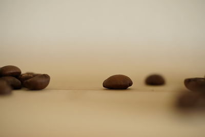 Close-up of cupcakes on table against white background