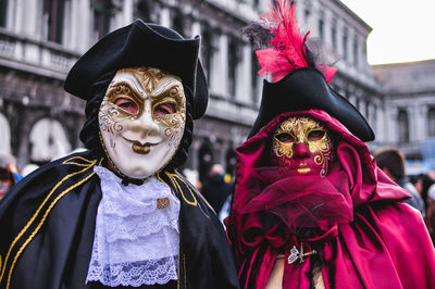 Close-up of mask with umbrella