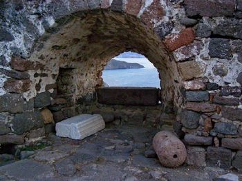 Old stone wall by sea