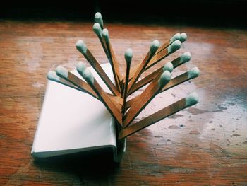 Close-up of matchstick on table