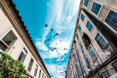 Low angle view of buildings against sky in lisbon, portugal