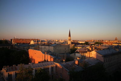 High angle view of townscape against sky during sunset