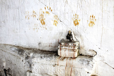 Hand prints on wall in india 