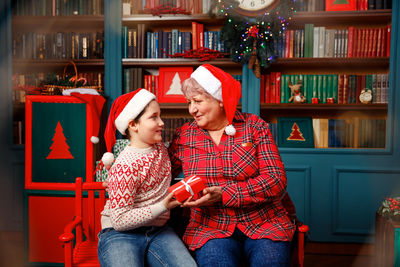 Loving grandma enjoying time with his grandson. xmas traditions.