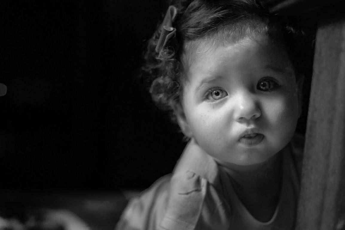 child, childhood, portrait, innocence, cute, one person, headshot, real people, front view, focus on foreground, looking at camera, toddler, close-up, men, lifestyles, looking, young, babyhood, black background, human face