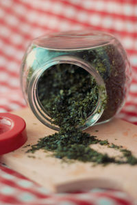 Close-up of food in jar on table