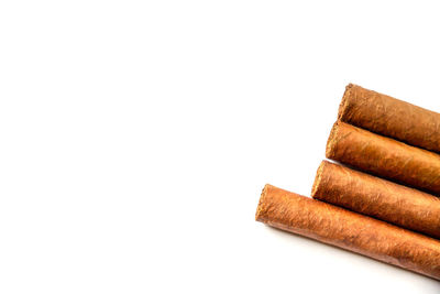Close-up of stack against white background
