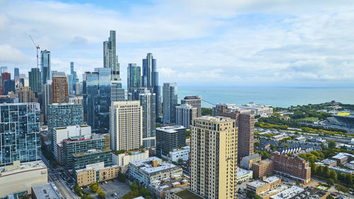 Aerial view of cityscape against sky