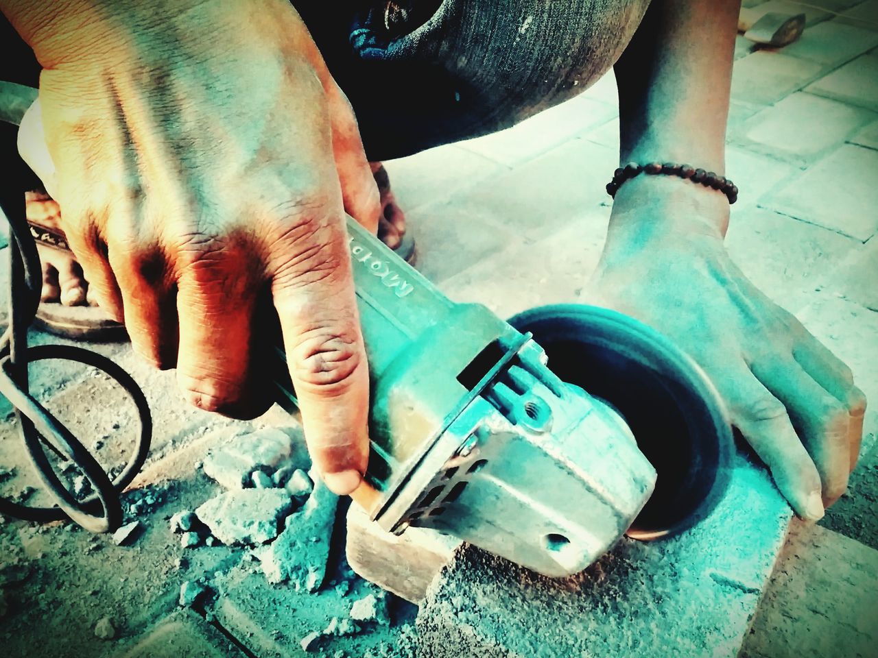 low section, person, high angle view, metal, part of, shoe, men, human foot, work tool, lifestyles, cropped, equipment, abandoned, working, obsolete, indoors, jeans