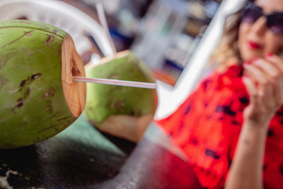 Close-up of coconuts on table