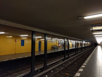 Railroad station platform at night