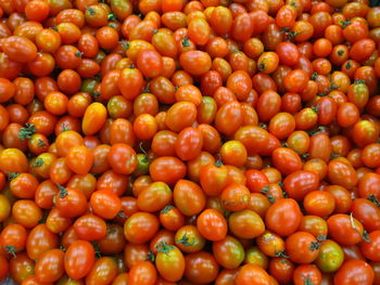 Full frame shot of cherry tomatos at market stall