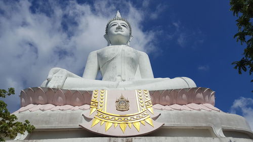 Low angle view of statue against sky