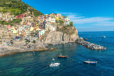 View of village houses  and sea bay of  manarola village at cinque terre area,  italy,  june, 2019.