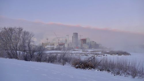 Smoke emitting from factory during winter