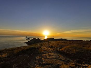 Scenic view of sea against sky during sunset