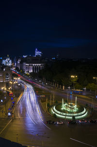 High angle view of light trails on road during night