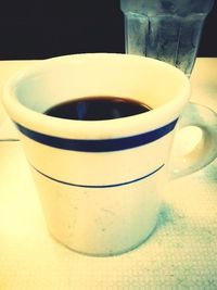 Close-up of coffee cup on table