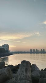 Scenic view of sea against sky at sunset