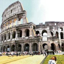 Tourists in front of historic building