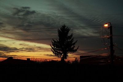 Low angle view of built structure against sky at dusk