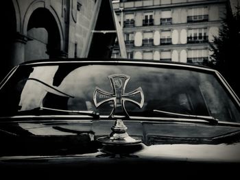 Reflection of building on car window