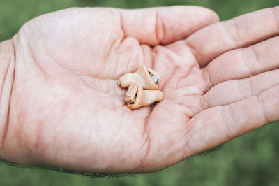 Close-up of person holding hands