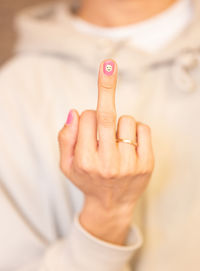 Cropped hand of woman wearing ring