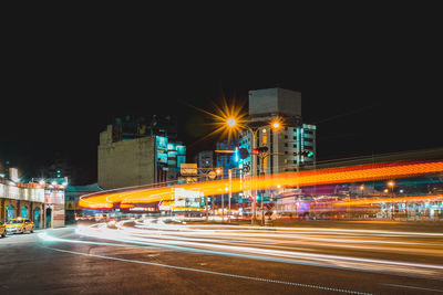 Light trails on city street at night