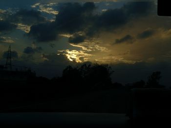 Scenic view of dramatic sky at sunset