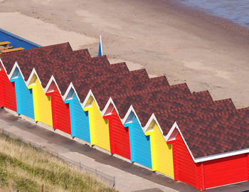 High angle view of colorful huts at beach