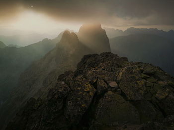 Scenic view of rocky mountains against sky