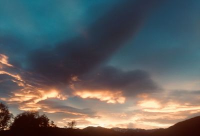 Low angle view of dramatic sky during sunset