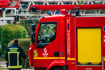 Rear view of red bus