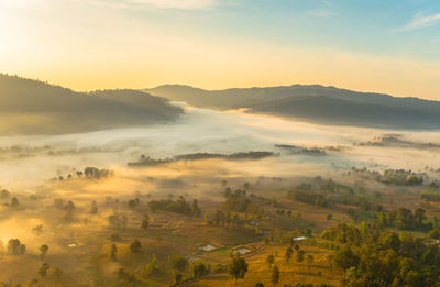 Scenic view of landscape against sky during sunset