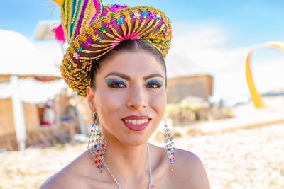 Close-up of young woman wearing hat