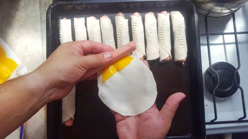 Close-up of hand holding ice cream