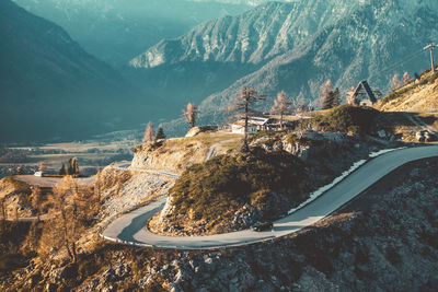 High angle view of road by mountains against sky