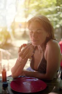 Close-up of man eating food