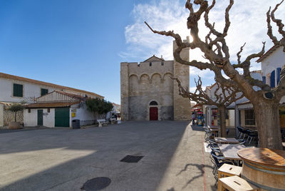 Exterior of historic building against sky in city