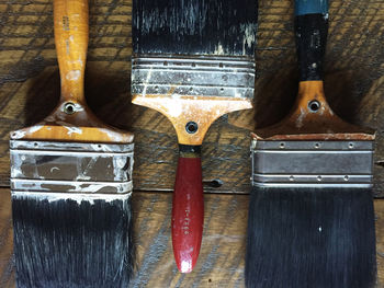 Close-up of paintbrushes on table