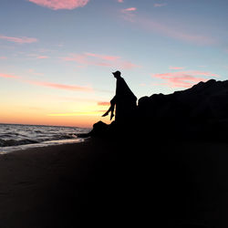 Scenic view of sea at sunset