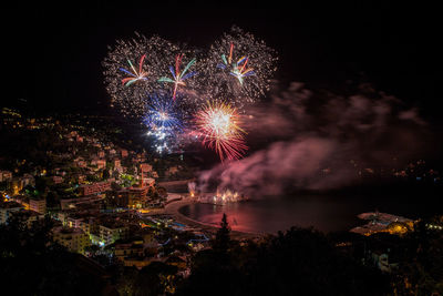 Firework display at night