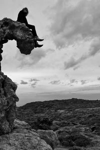 Low angle view of rocks against sky