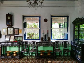 Chairs and tables in glass window